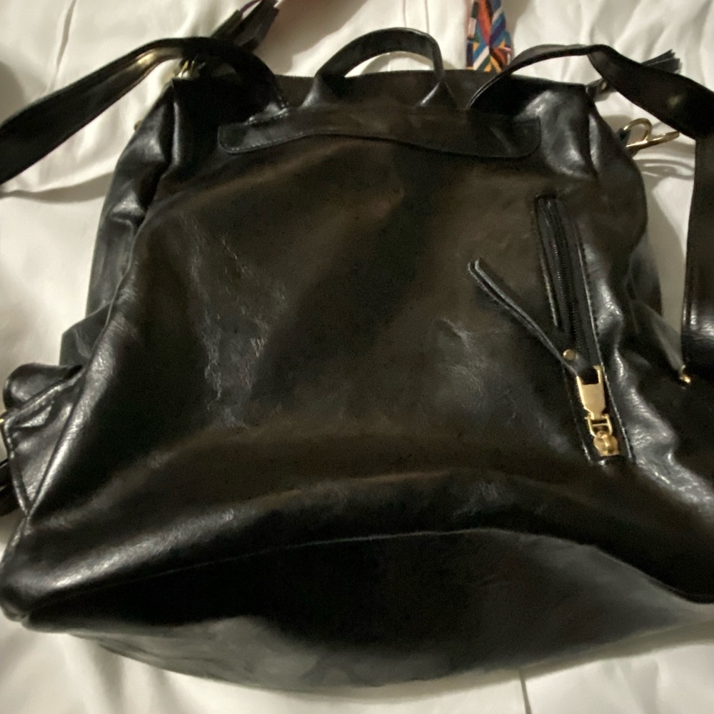 Black Brielle type backpack.